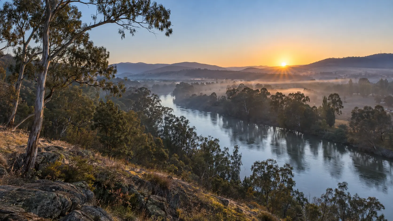 Misty winter sunrise over the Murray River region near Albury and Wodonga